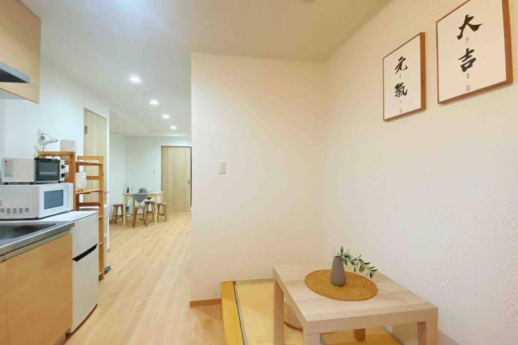 Appartement 外國人大歡迎心齋橋難波大阪城公園電車直達關西機場動物園駅300m環球影城30分鐘情侣家庭夫妻1 *